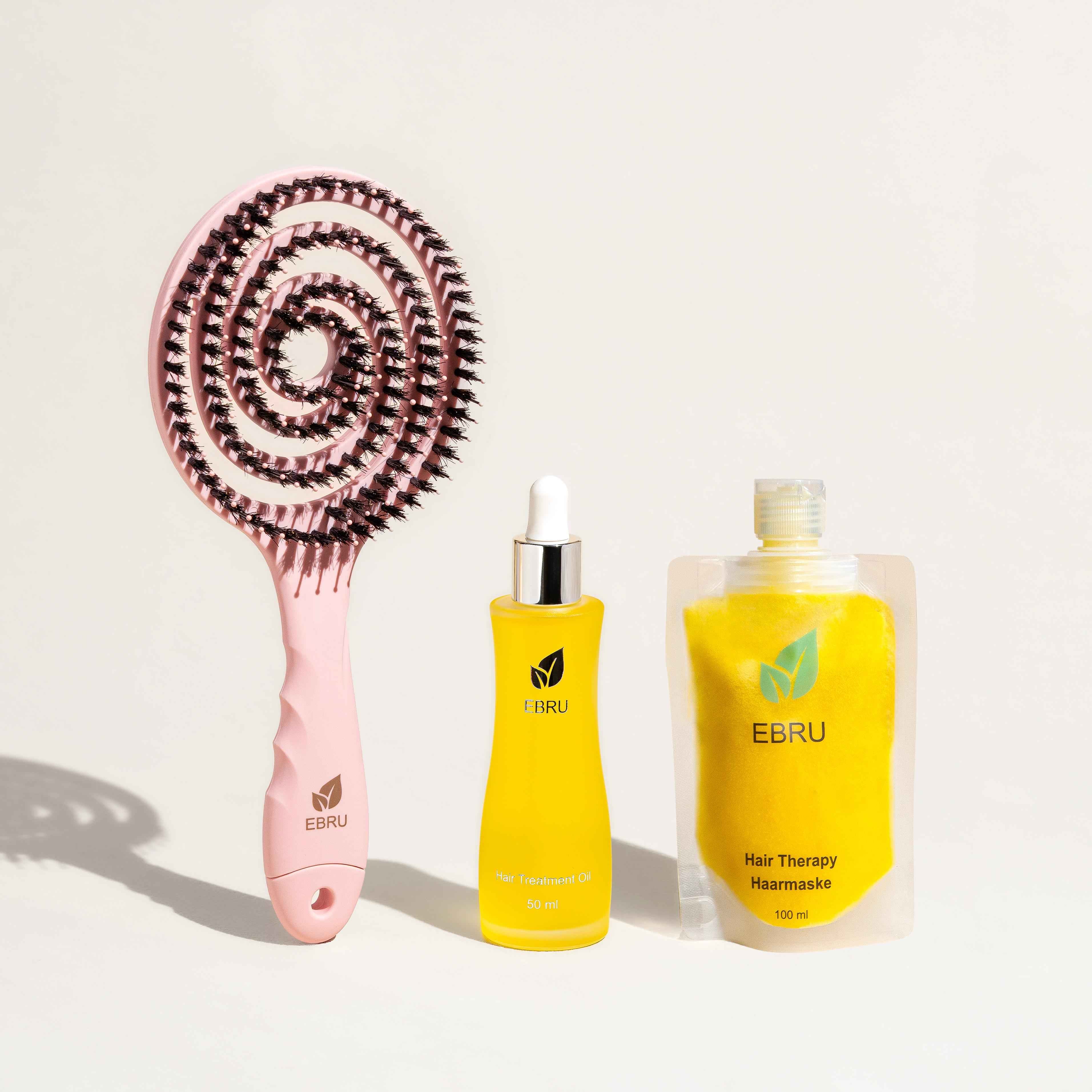 Hair Treatment Trio mit pinker Haarbürste, Haaröl und Haarmaske